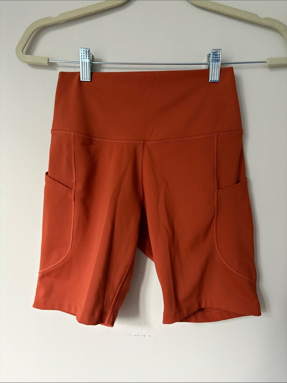 Nike Women's Rust Orange High-Rise Bike Shorts with Side Pockets